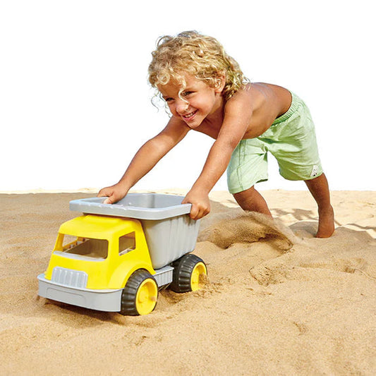 Hape Load & Tote Dump Truck | Beach Toy Construction Vehicle available at Bear & Moo