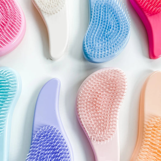 Mini Mane Mini Detangling Brush available at Bear & Moo